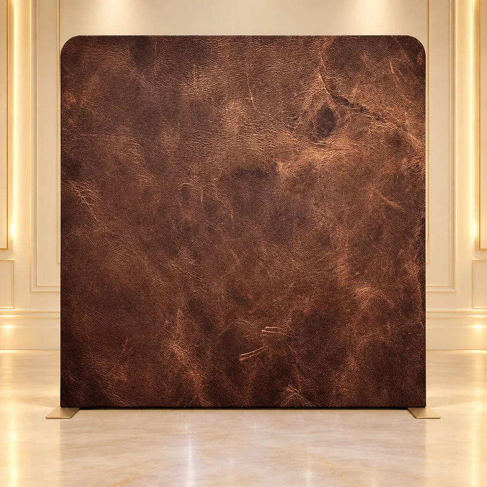 Vintage Leather premium photo booth backdrop displayed in a luxury showroom