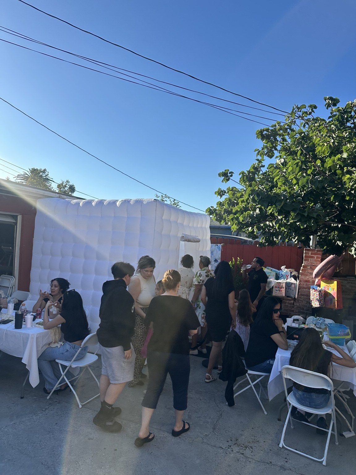 Mateo Benjamin's Baptism outdoor white inflatable booth setup in Los Angeles by Studio RDRGZ LA